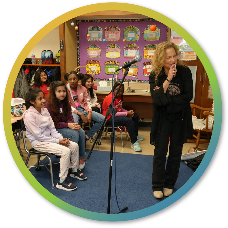 alice-with-students-in-making-math-musical